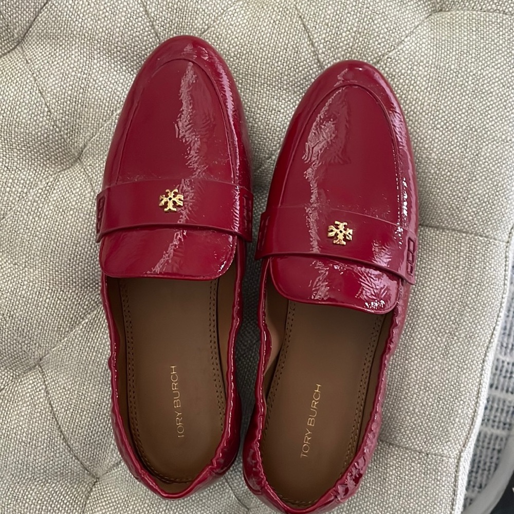 Tory Burch red patent flat.  Perfect condition.  Barely worn
